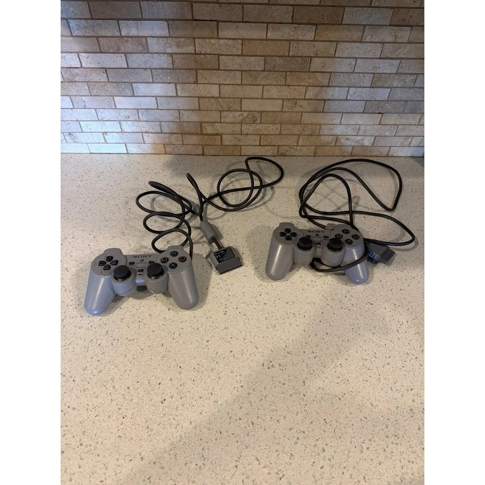 Lot 2 Sony PlayStation PS1 DualShock Analog Controllers Gray